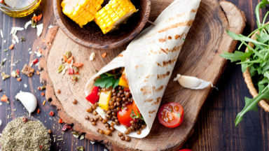 Cooked lentil burritos wrapped in a tortilla. Cooked lentil burritos wrapped in a tortilla.