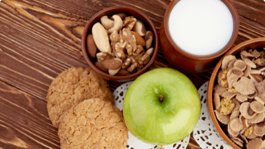 Maple apple bran biscuits with a glass of milk.  Maple apple bran biscuits with a glass of milk.